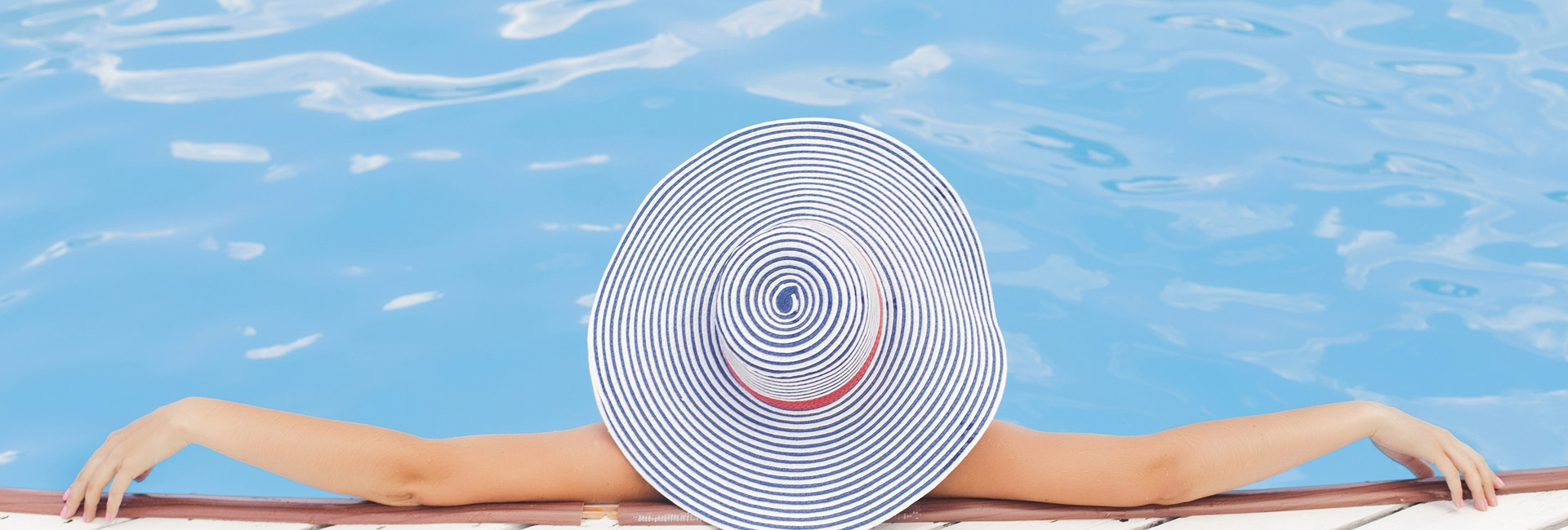 inground-swimming-pool-lady-in-hat